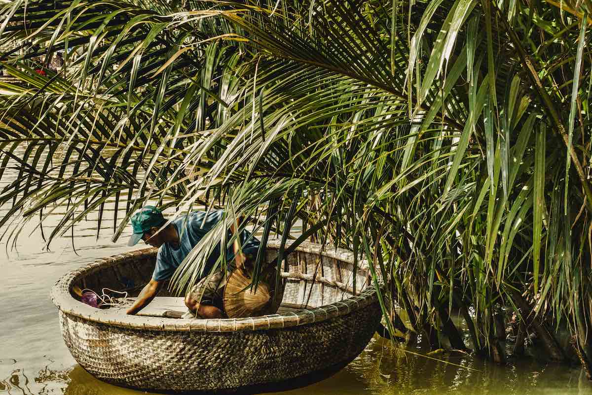 Man on a basket boat in Hoi An, Vietnam